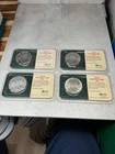 '88 '92 '95 & 2010 Silver Eagle Coins in Littleton Packaging (4 Coin Lot)