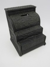 Vintage "Junior Cash" cast iron cash register shaped still bank
