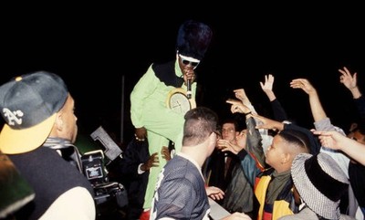 Rapper Flavor Flav of Public Enemy takes his show to the fans duri- Old Photo