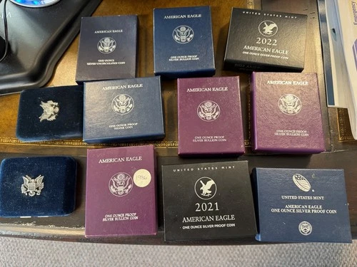 LOT OF 11 AMERICAN EAGLE SILVER DOLLARS PROOF COINS 1986, 1989, 1998, 2005, 2002