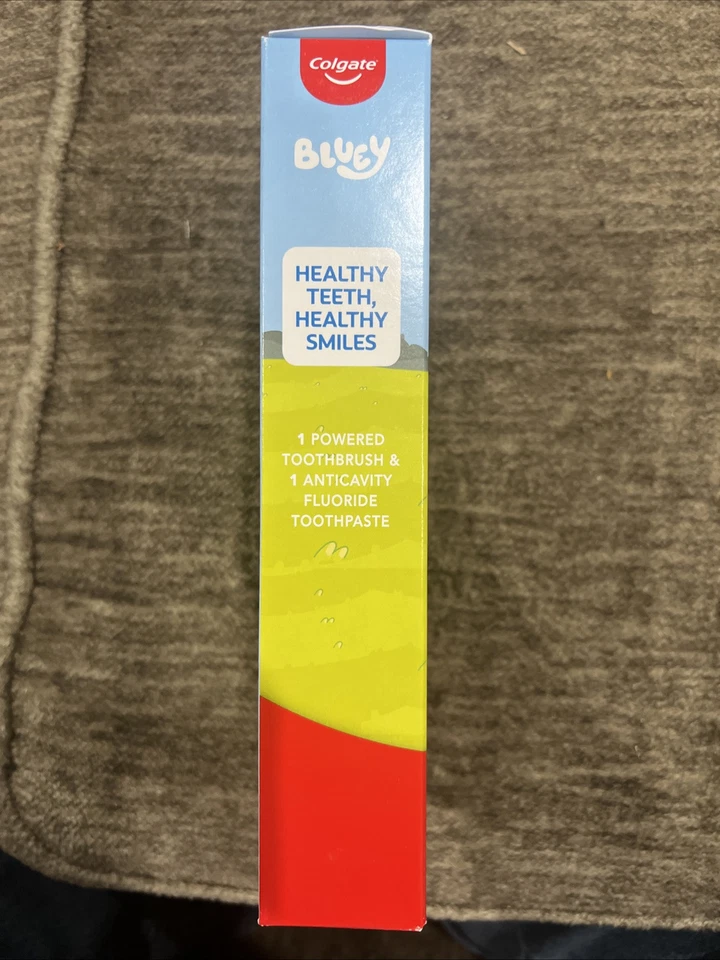 NUEVO Paquete de regalo sellado COLGATE BLUEY cepillo de dientes eléctrico y pasta de dientes de frutas con burbujas Foto 3 de 4