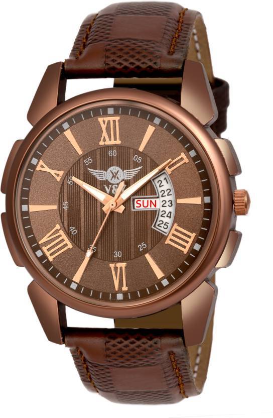 analog watch with date and day display