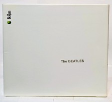The Beatles White Album On 2 Digitaly Remastered And Enhanced CDs.  2 Pamphlets
