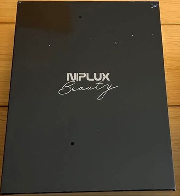 NIPLUX BEAUTY QRELLE Facial Roller EMS Vibration Home Skin Care Device Pink New