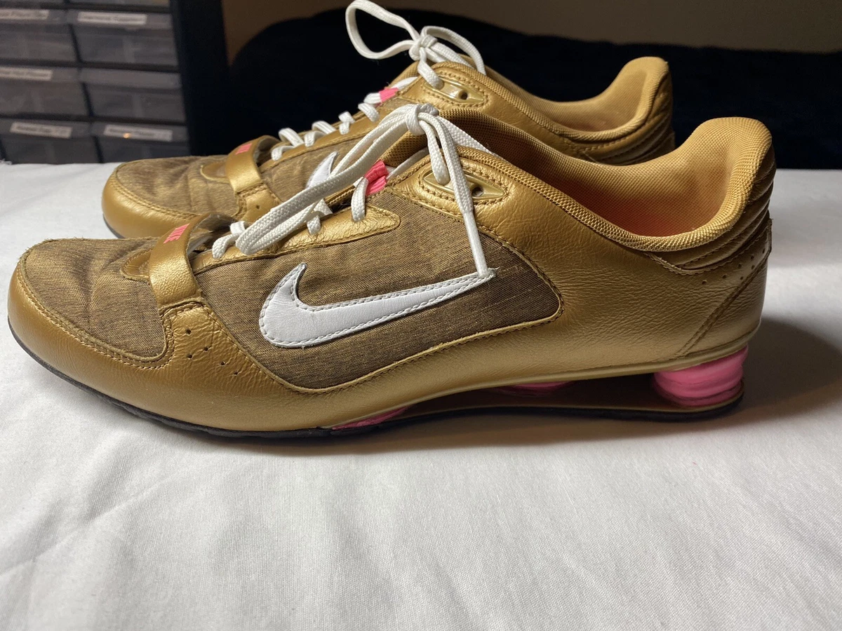 Gold nike shox womens sale