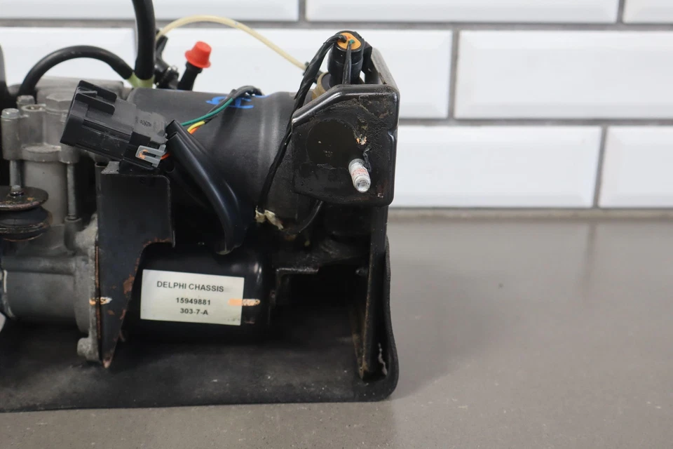 Compresor de aire nivelador automático Chevy Suburban 1500 07-14 Foto 4 de 4