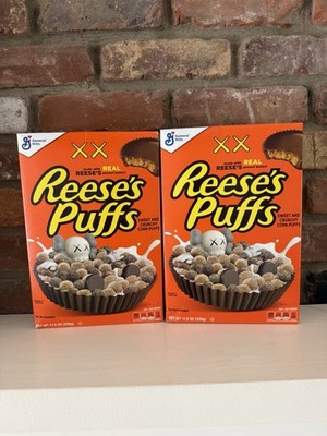KAWS X Reeses Puffs Cereal Lot Of2 REGULAR Size BRAND NEW NEVER OPENED