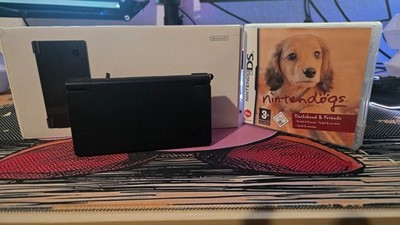 Nintendo DSi mit Originalverpackung und originalem Ladekabel mit  Nintendogs