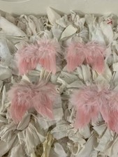 Wings Four Powder puff pink