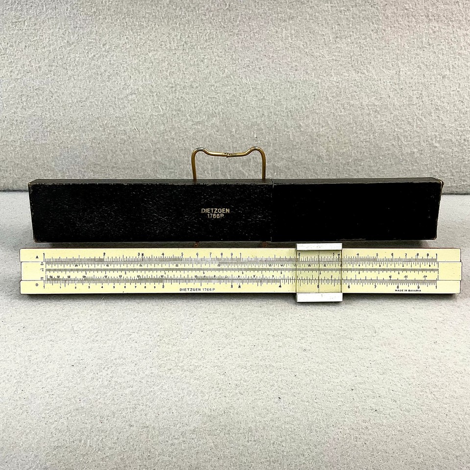 A Bavarian-made Dietzgen slide rule with original case — the analog calculator of engineers before silicon was a thing.