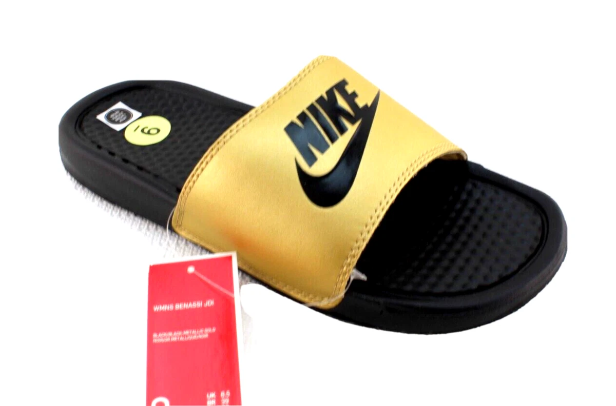 Nike slippers top gold logo