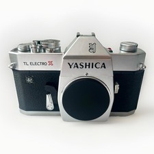 Yashica TL Electro-X 35mm SLR Camera Body Only. Works But Repair Needed. Read 