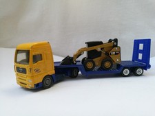 SIKU Transporter mit Ladung Caterpillar 272D