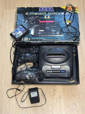 Sega Mega Drive II 2 console in box, controllers