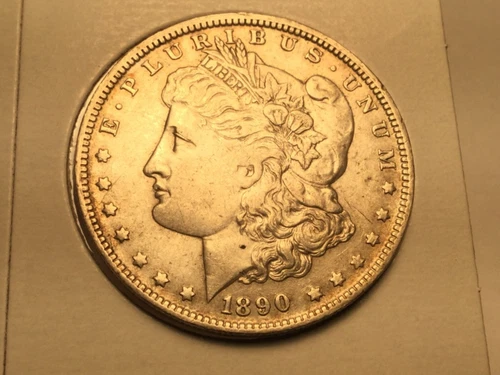 1890-O Morgan Dollar in almost uncirculated