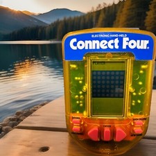 1995 Milton Bradley Connect Four Electronic Handheld LCD Game Factory Sealed