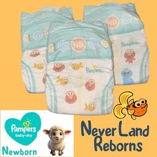Pampers Baby Dry Bundle Includes 3 diapers, changing chart  coupons. Newborn