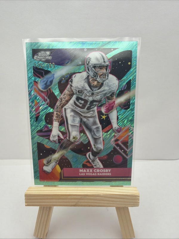 2025 Topps Chrome Cosmic Football Maxx Crosby /199 Aqua Shimmer