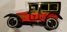 tin plate clockwork car in box with key