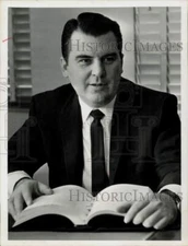 1963 Press Photo Reverend Hartsell Gray looks over documents. - hpa58799