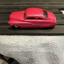 Auto World Xtraction Lead Sled Pinkish Red Slot Car