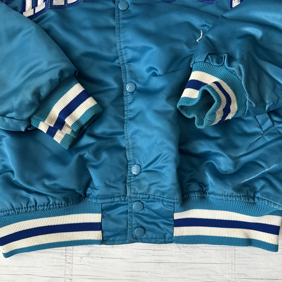 Vintage 90s NBA Starter Charlotte Hornets spellout Satin Vintage 90s NBA Starter Charlotte Hornets spellout Satin