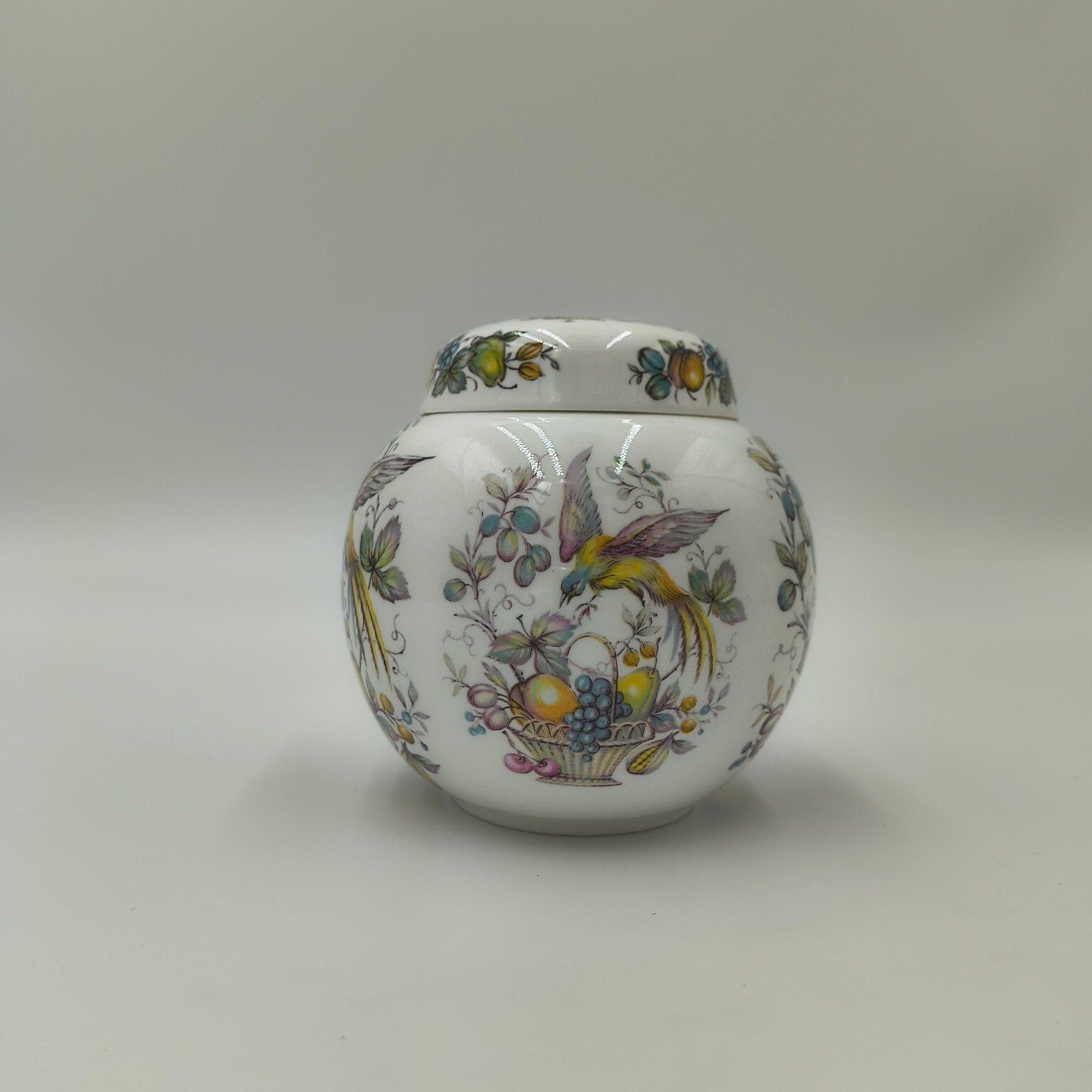 Woods of Windsor bone china lidded ginger jar, bird and fruit,Staffordshire. 143