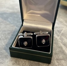 Gemelos de cristal negros y plateados firmados por Swarovski en buen estado