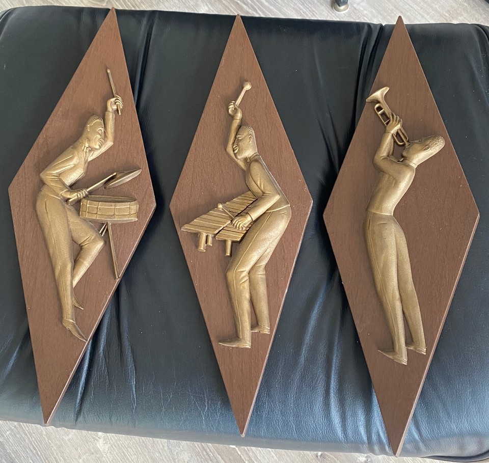 Mid-century Burwood molded plastic jazz musician wall hangings — the kind of soulful MCM art that stops guests mid-sentence.