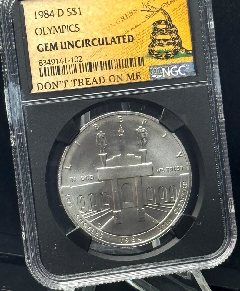 1984-D Olympic $1 🇺🇸 NGC GEM UNC 🐍 DTOM Label – Patriotic Silver Dollar 💎 - Image 4 of 4