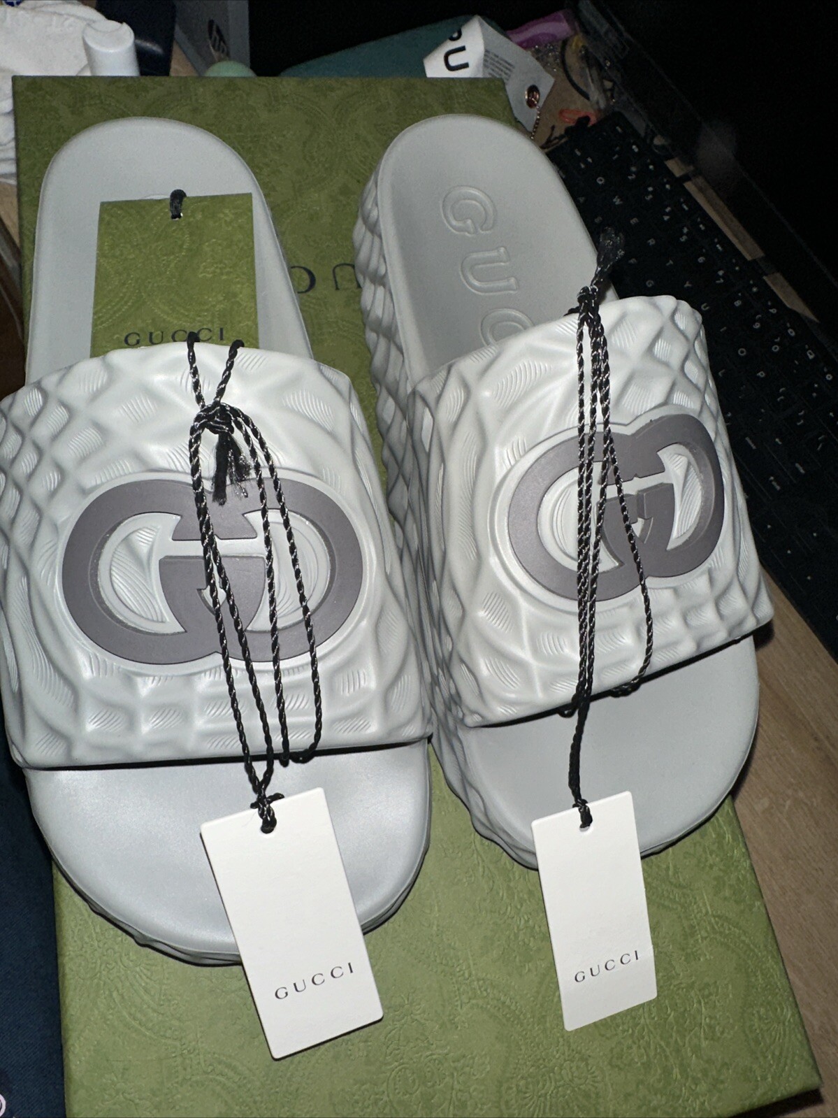 Gucci Grey Rubber Slides with Iconic Logo Design-image
