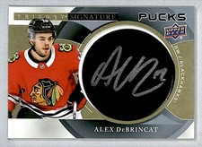 Alex DeBrincat 2019-20 UD Trilogy Signature Pucks Auto #SP-AD Chicago Blackhawks