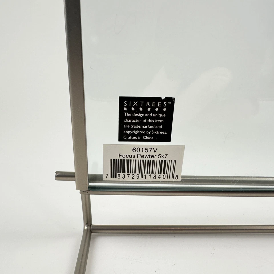 Marco de fotos de metal y vidrio para decoración de estudio - Expositor de mesa minimalista moderno Foto 4 de 4