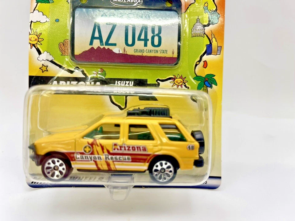 2001 MATCHBOX ACROSS AMERICA Arizona Isuzu Rodeo Canyon RESCUE #48 Yellow SUV - Image 2 of 2