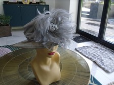 smaller size ladies lovely grey feather  and diamonte wedding hat
