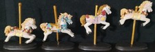 Set of 4 Galloping Carousel Horses in various stages of vertical motion