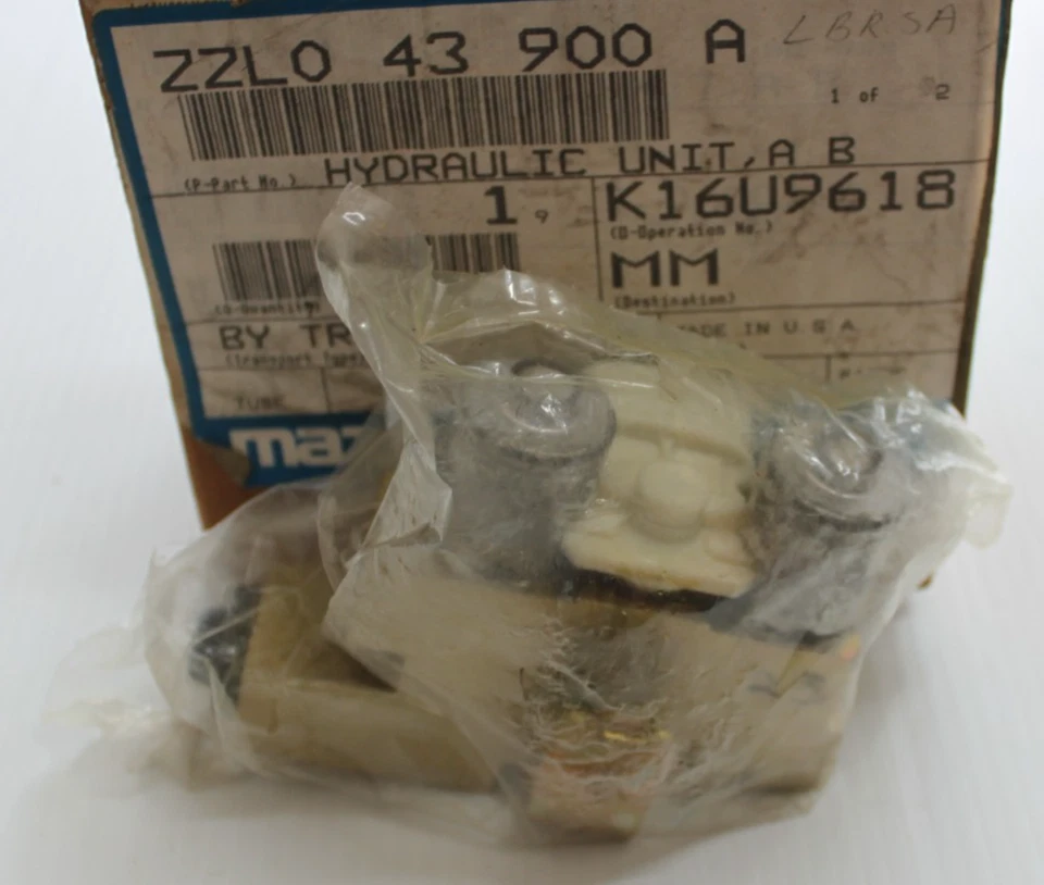 PIEZA VÁLVULA HIDRÁULICA ABS GENUINA FORD #ZZL0-43-900A/E9TZ-2B373-A Foto 2 de 3