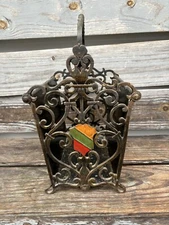 Antique Cast Iron Ornate Magazine Rack With Beautiful Colored Designs On Sides