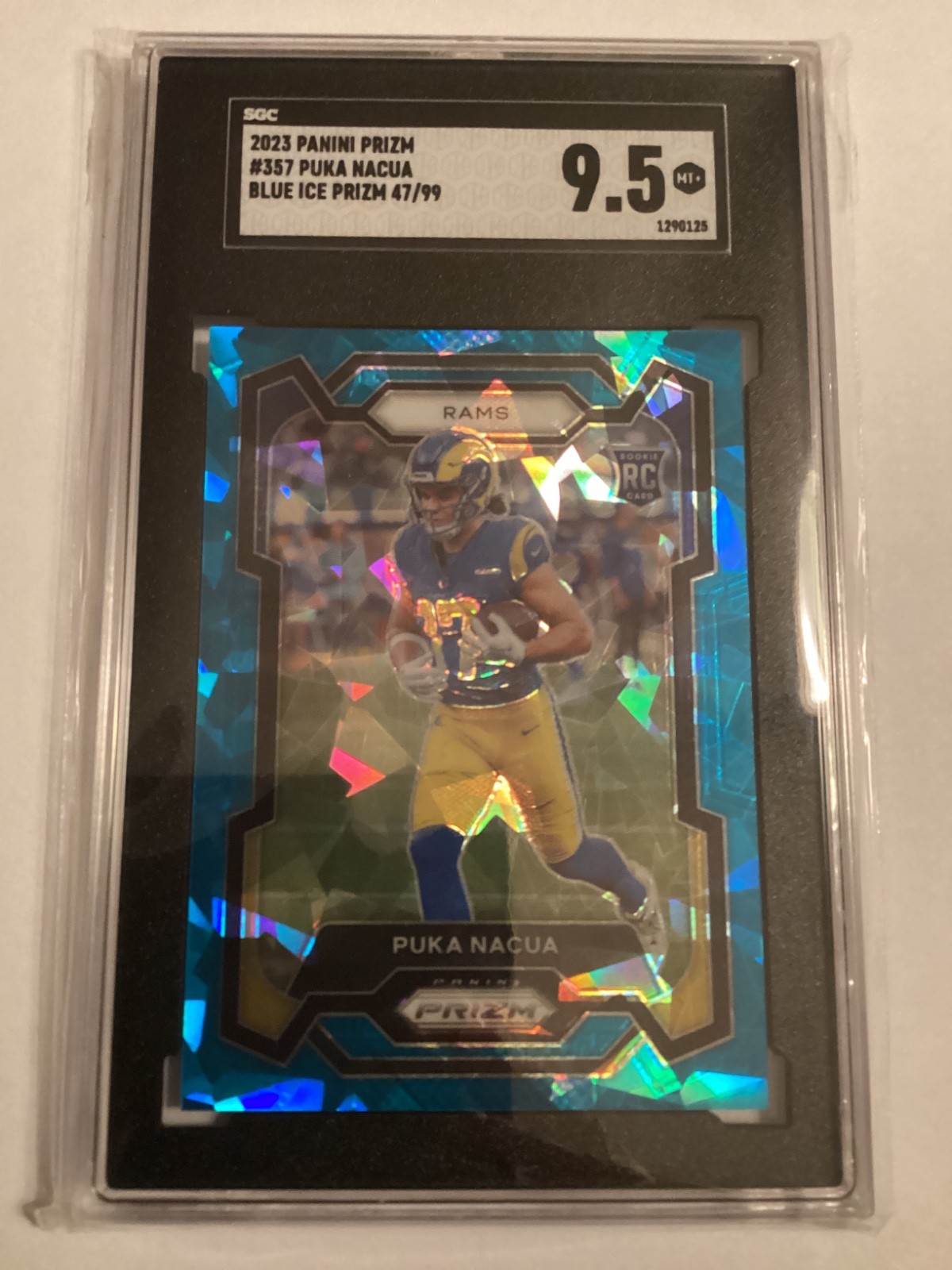 2023 Panini Prizm #357 Puka Nacua Blue Ice Prizm /99 SGC 9.5 LA Rams
