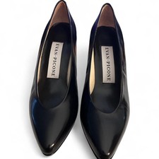Vintage black leather pointed toe pumps with kitten heel