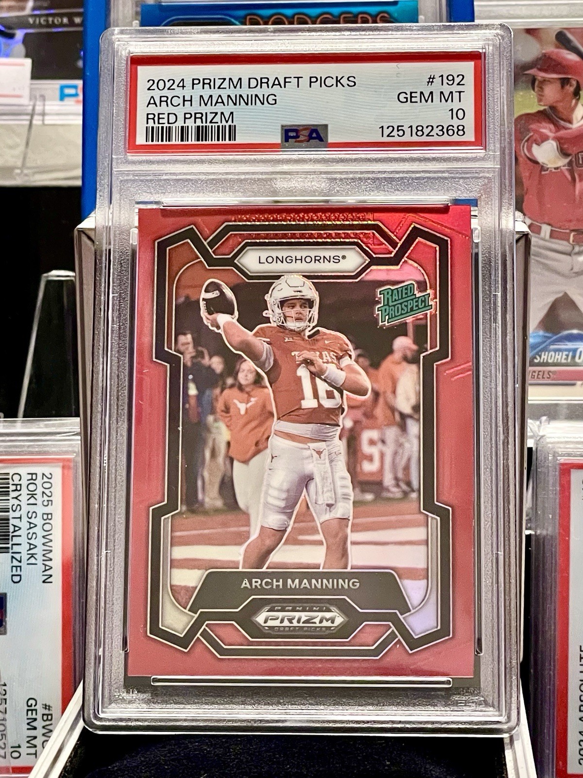 2024 Prizm Draft Picks Rated Prospects ARCH MANNING Red Prizm 173/299 PSA 10