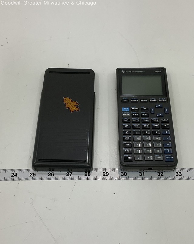 Texas Instruments Black TI-82 Graphing Calculator Plastic Cover Included