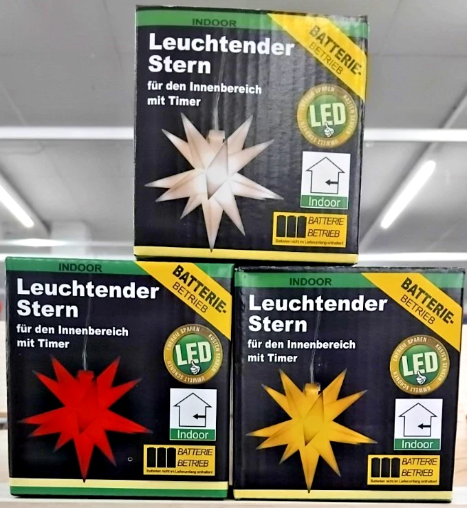 gesteck mit weihnachtsstern Weihnachtsstern Weihnachtsgesteck Kerze Zapfen rot main image 0