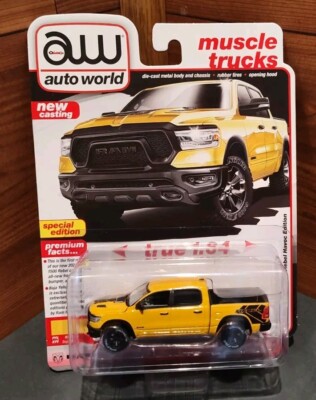 NEW AUTO WORLD BAJA YELLOW 2023 RAM 1500 REBEL HAVOC EDITION
