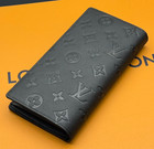 Louis Vuitton Black Leather Long Flap Wallet — photo 2