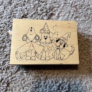 Puppies in Halloween costumes Stamp