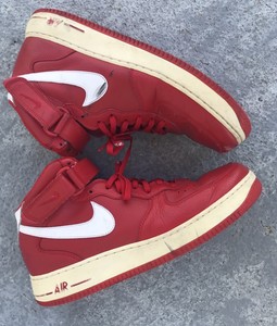 white and red air force 1 high tops