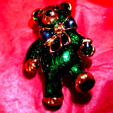Green vintage teddy bear with a blue bow Cutest teddy bear I've ever seen 
