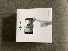 DJI OM 4 Smartphone Gimbal Stabilizer New with Tripod and Carrying Case