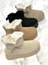 Stivaletti medi e dettagli fiocco foderati in pelliccia plateau scamosciati bambino.EU 31- 36